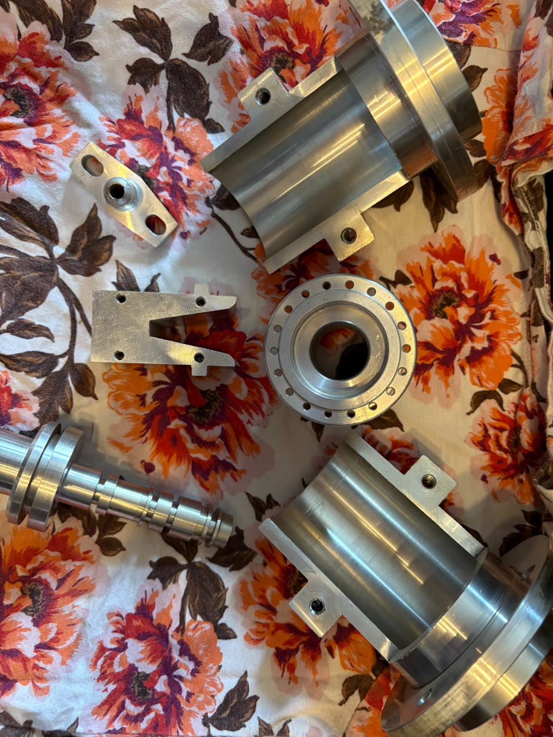 Heavy-duty precision aluminum flanged housings and components machined by RPM Machining